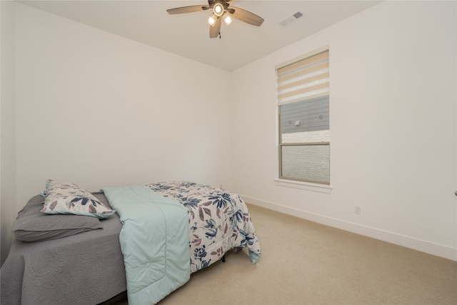9415 Royal Forest Dr, Oak Point, TX 75068 - bedroom with light colored carpet, baseboards, and a ceiling fan