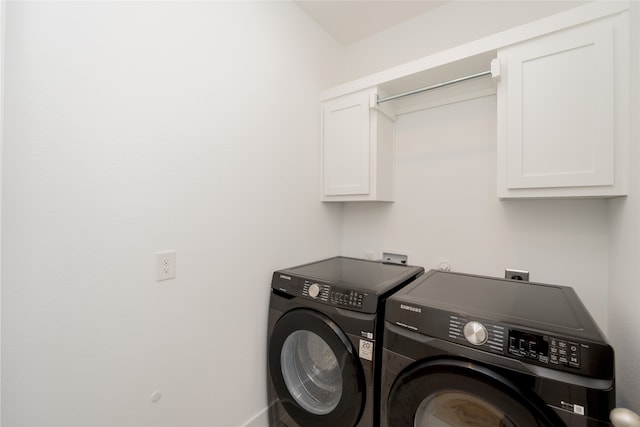9415 Royal Forest Dr, Oak Point, TX 75068 - laundry room featuring cabinet space, washing machine and dryer, and baseboards