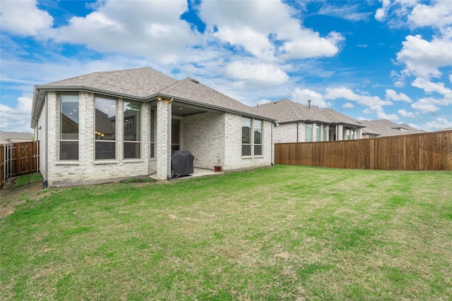 9415 Royal Forest Dr, Oak Point, TX 75068 - back of property featuring a shingled roof and brick siding