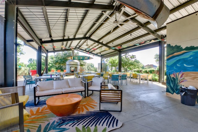 9415 Royal Forest Dr, Oak Point, TX 75068 - view of patio / terrace with outdoor dining area and an outdoor living space with a fireplace