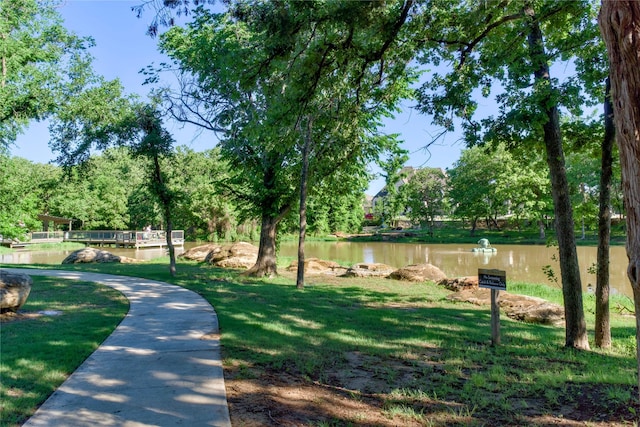 9415 Royal Forest Dr, Oak Point, TX 75068 - view of home's community with a water view, a yard, and view of scattered trees