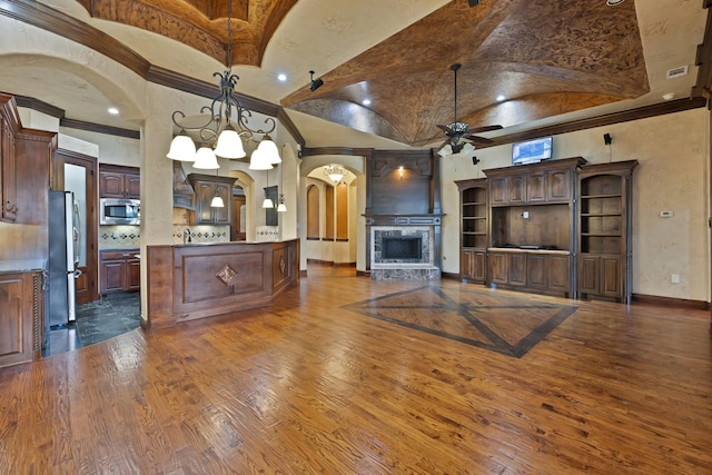 1206 Genesis Dr, Mansfield, TX 76063 - unfurnished living room with a ceiling fan, dark wood-style flooring, baseboards, ornamental molding, and a fireplace with raised hearth