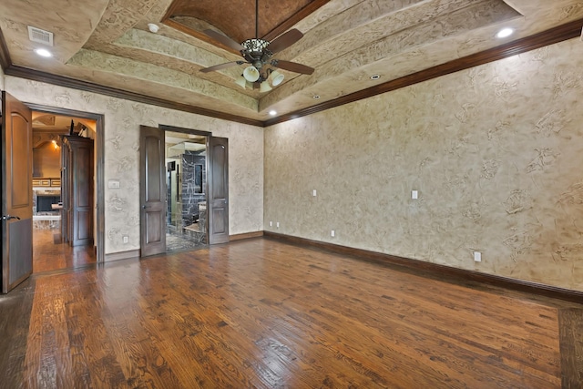 1206 Genesis Dr, Mansfield, TX 76063 - unfurnished room featuring a ceiling fan, baseboards, visible vents, crown molding, and dark wood-type flooring