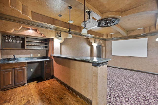 1206 Genesis Dr, Mansfield, TX 76063 - bar featuring pendant lighting, coffered ceiling, a sink, indoor wet bar, and a textured wall