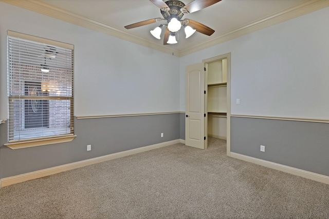 1206 Genesis Dr, Mansfield, TX 76063 - unfurnished bedroom with carpet flooring, crown molding, baseboards, a spacious closet, and ceiling fan