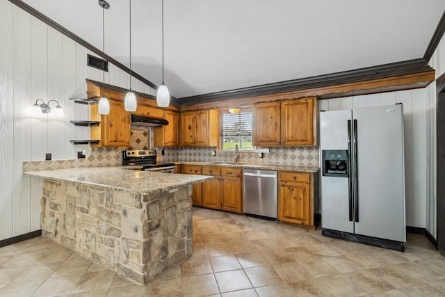 2328 Wildwood Way, Tool, TX 75143 - kitchen with appliances with stainless steel finishes, brown cabinetry, under cabinet range hood, a sink, and crown molding