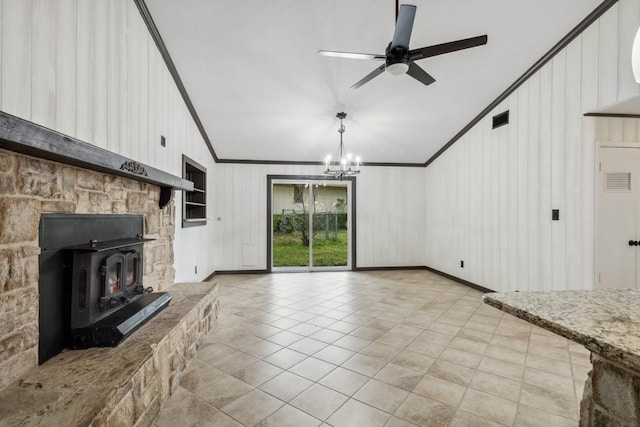 2328 Wildwood Way, Tool, TX 75143 - unfurnished living room with crown molding, lofted ceiling, ceiling fan, a chandelier, and a wood stove