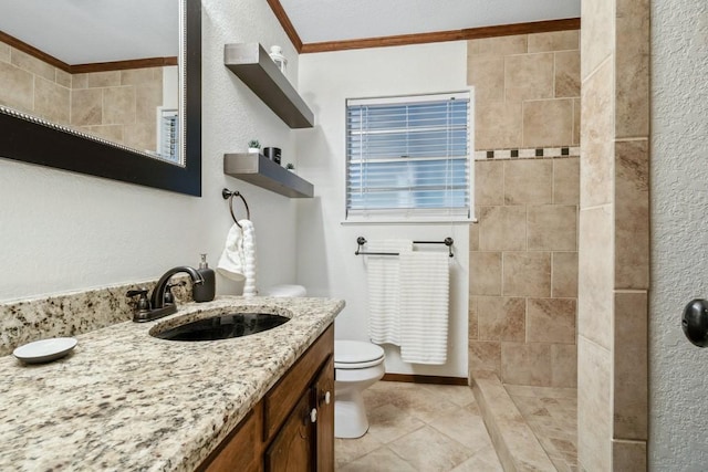 2328 Wildwood Way, Tool, TX 75143 - bathroom featuring ornamental molding, tiled shower, tile patterned floors, toilet, and vanity