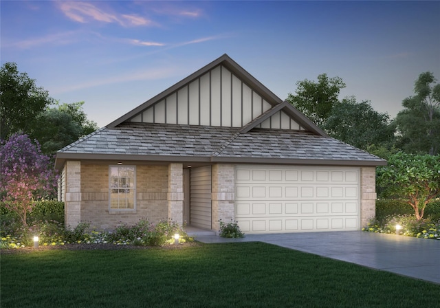 3117 Harmony Way, Cleburne, TX 76033 - view of front of home featuring board and batten siding, driveway, brick siding, a garage, and a front lawn