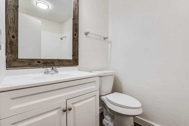 2210 Sheriff Dr, Grand Prairie, TX 75051 - bathroom featuring toilet and vanity