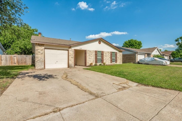 2210 Sheriff Dr, Grand Prairie, TX 75051 - ranch-style home featuring a garage, brick siding, concrete driveway, and a chimney