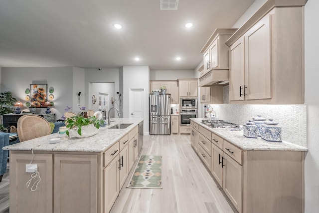 1076 Fleetwood Dr, Justin, TX 76247 - kitchen featuring appliances with stainless steel finishes, custom exhaust hood, a kitchen bar, backsplash, and recessed lighting