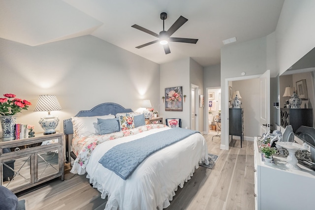 1076 Fleetwood Dr, Justin, TX 76247 - bedroom featuring lofted ceiling, light wood-style flooring, and ceiling fan