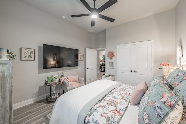 1076 Fleetwood Dr, Justin, TX 76247 - bedroom with wood finished floors, a closet, baseboards, and a ceiling fan
