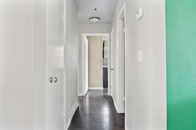 3100 Karla, Mesquite, TX 75150 - hall featuring dark wood finished floors and baseboards