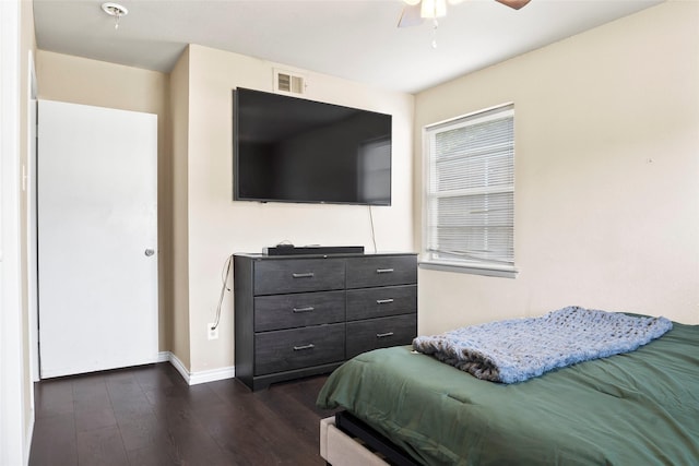 3100 Karla, Mesquite, TX 75150 - bedroom featuring dark wood finished floors, baseboards, and ceiling fan