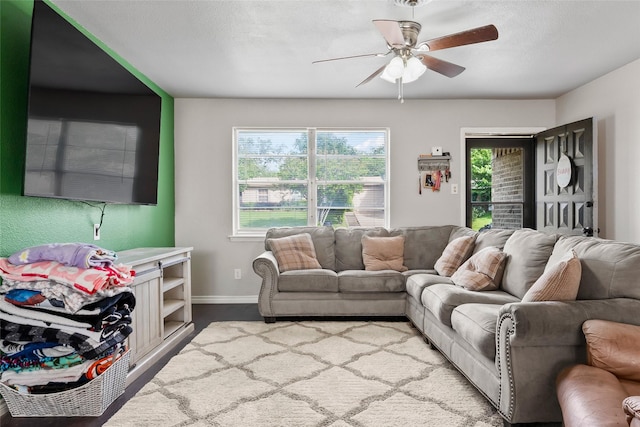 3100 Karla, Mesquite, TX 75150 - living room with ceiling fan and baseboards
