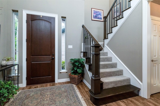 3528 Clubgate Dr, Fort Worth, TX 76137 - foyer entrance with baseboards, stairway, and wood finished floors