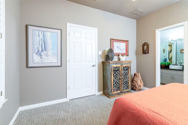 3528 Clubgate Dr, Fort Worth, TX 76137 - carpeted bedroom with baseboards, visible vents, and a sink