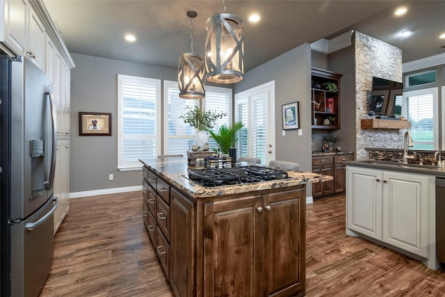 3528 Clubgate Dr, Fort Worth, TX 76137 - kitchen with stainless steel fridge, black gas stovetop, dark wood-type flooring, and a sink