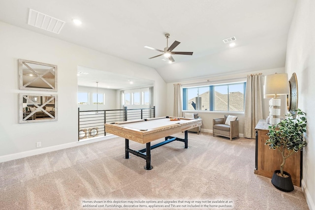 rec room with vaulted ceiling, ceiling fan, light carpet, and visible vents