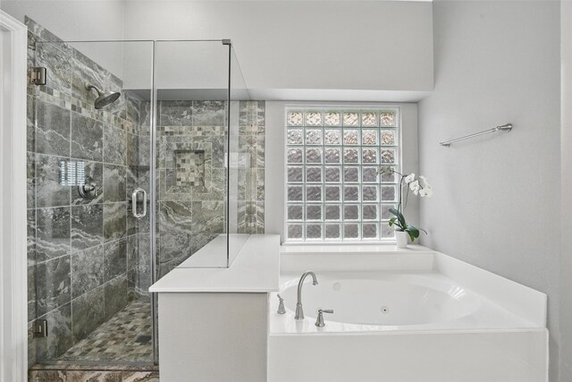 209 Odyssey Ln, Mansfield, TX 76063 - bathroom featuring a tub with jets and a stall shower