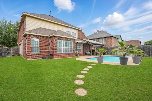 209 Odyssey Ln, Mansfield, TX 76063 - back of property with a fenced backyard, a patio area, and a yard
