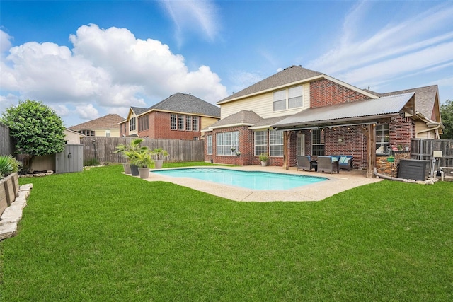 209 Odyssey Ln, Mansfield, TX 76063 - view of pool featuring a storage shed, a yard, a patio area, and a fenced backyard