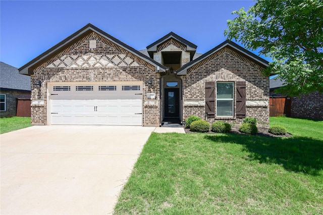 250 Martis Way, Abilene, TX 79602 - view of front of home with a garage, a front lawn, brick siding, and driveway