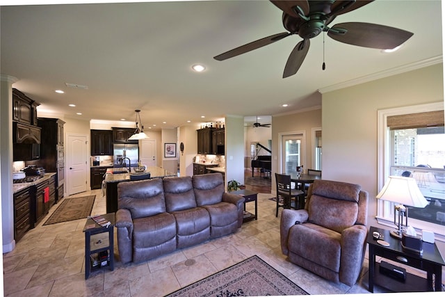 8301 Cimarron Trl, Abilene, TX 79606 - living room with recessed lighting, ornamental molding, and ceiling fan