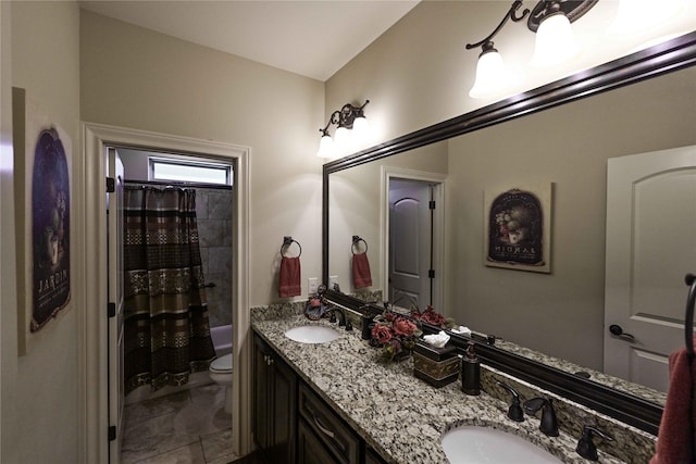8301 Cimarron Trl, Abilene, TX 79606 - full bathroom with double vanity, toilet, and a sink
