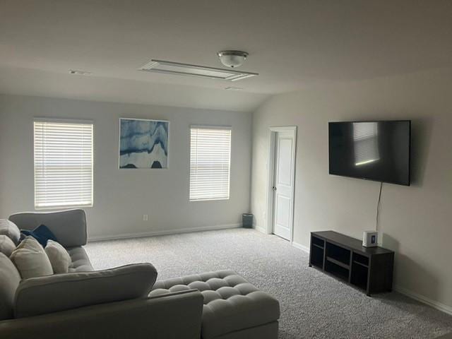 213 Irvin Dr, Royse City, TX 75189 - living area featuring carpet flooring, baseboards, and lofted ceiling