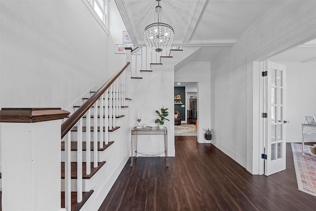 stairs featuring wood finished floors, baseboards, beamed ceiling, coffered ceiling, and a notable chandelier