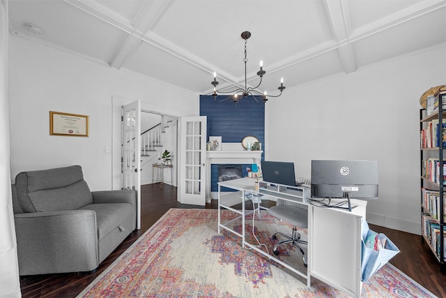 office area featuring a chandelier, beam ceiling, coffered ceiling, and wood finished floors