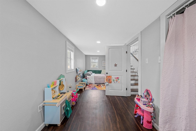 rec room with baseboards, recessed lighting, and wood finished floors