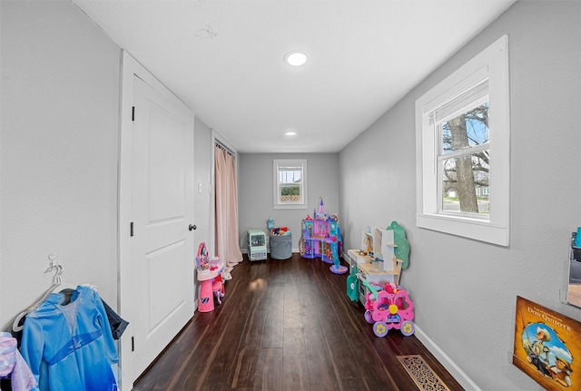 rec room with baseboards, recessed lighting, and wood finished floors