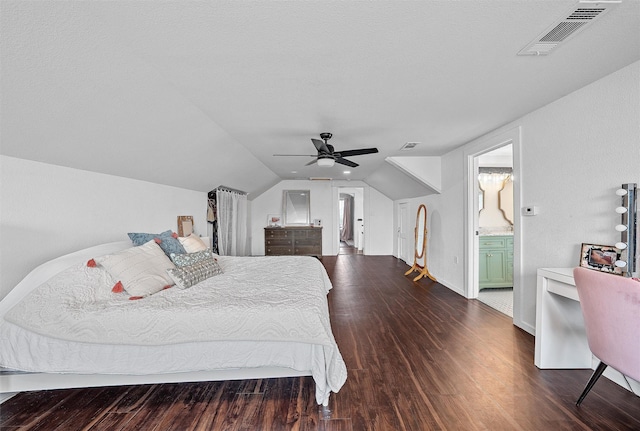 bedroom featuring vaulted ceiling, ceiling fan, dark wood-style floors, and visible vents