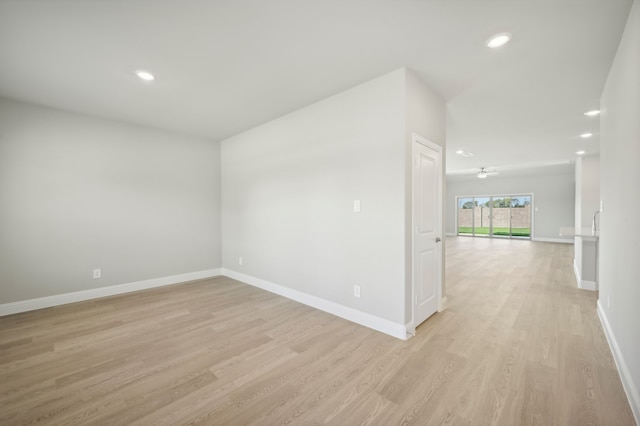 604 Willet Dr, Mckinney, TX 75069 - spare room featuring light wood finished floors, baseboards, and recessed lighting