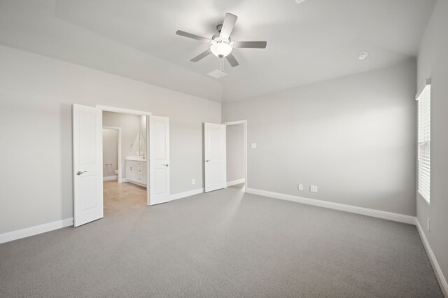 604 Willet Dr, Mckinney, TX 75069 - unfurnished bedroom with carpet, multiple windows, baseboards, and high vaulted ceiling