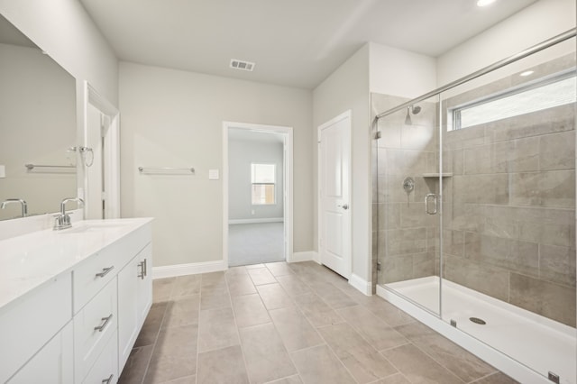 604 Willet Dr, Mckinney, TX 75069 - bathroom featuring a stall shower, vanity, tile patterned floors, baseboards, and recessed lighting