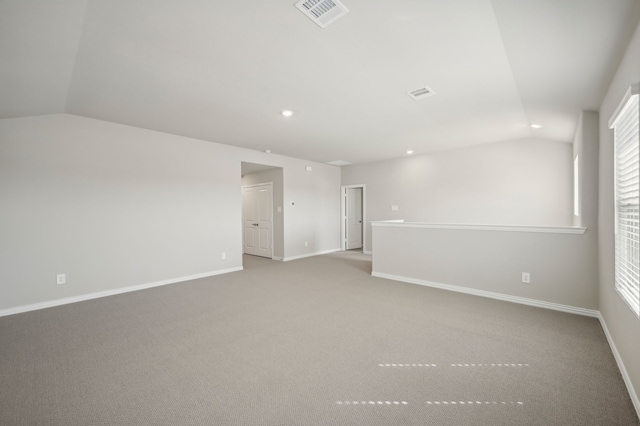 604 Willet Dr, Mckinney, TX 75069 - spare room with lofted ceiling, light carpet, baseboards, and recessed lighting