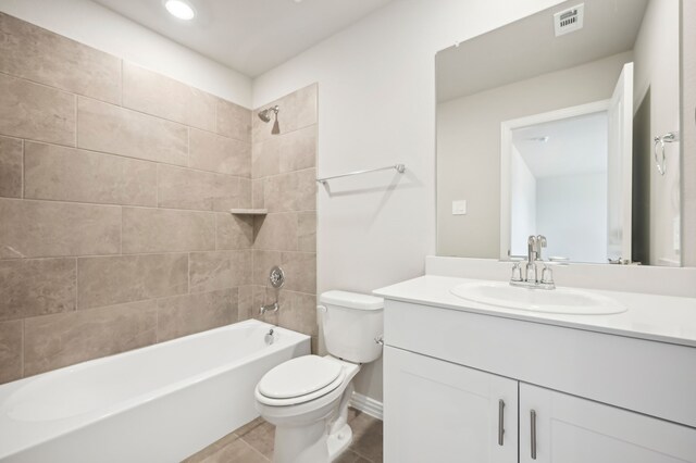 604 Willet Dr, Mckinney, TX 75069 - full bath featuring toilet, tile patterned flooring, tub / shower combination, vanity, and baseboards