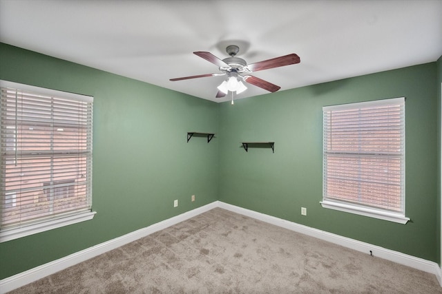 13336 Patito Pl Unit 7, Dallas, TX 75240 - carpeted empty room featuring baseboards and ceiling fan