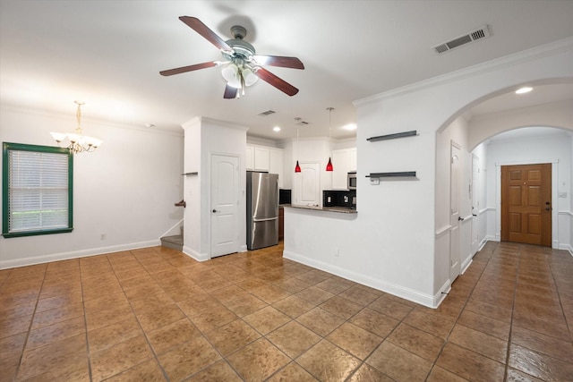 13336 Patito Pl Unit 7, Dallas, TX 75240 - kitchen with appliances with stainless steel finishes, ceiling fan, ornamental molding, a chandelier, and white cabinetry