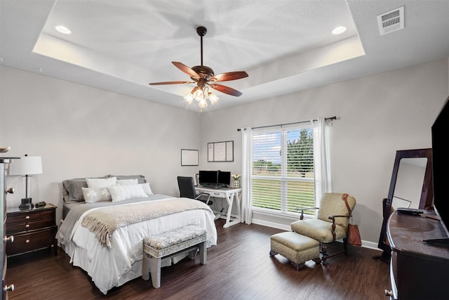 6093 S Fm 730, Decatur, TX 76234 - bedroom featuring a raised ceiling, baseboards, dark wood-type flooring, a desk, and recessed lighting