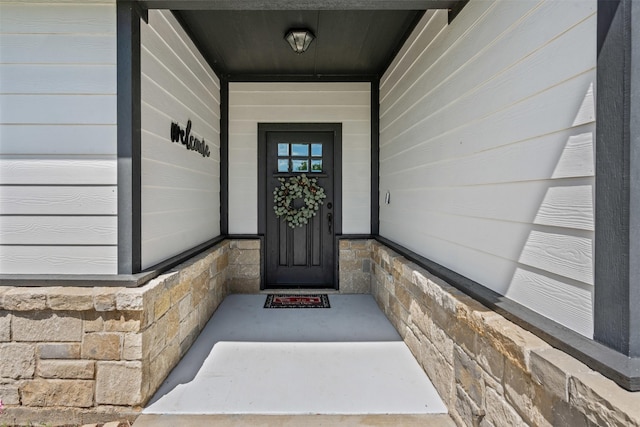 6093 S Fm 730, Decatur, TX 76234 - view of front facade with driveway, an attached garage, and stone siding
