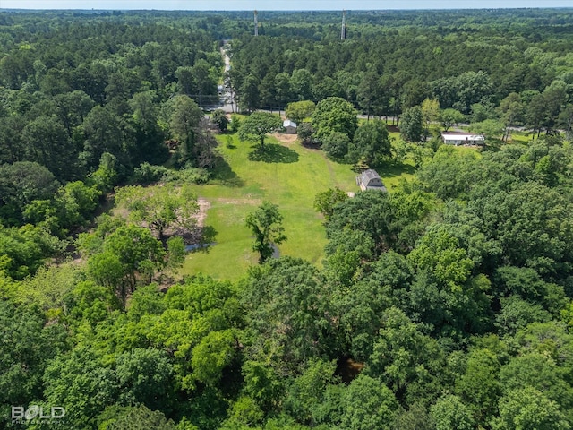 aerial view featuring a forest view