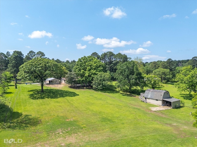 5764 Jefferson Paige Rd, Shreveport, LA 71119 - view of grassy yard featuring an outbuilding