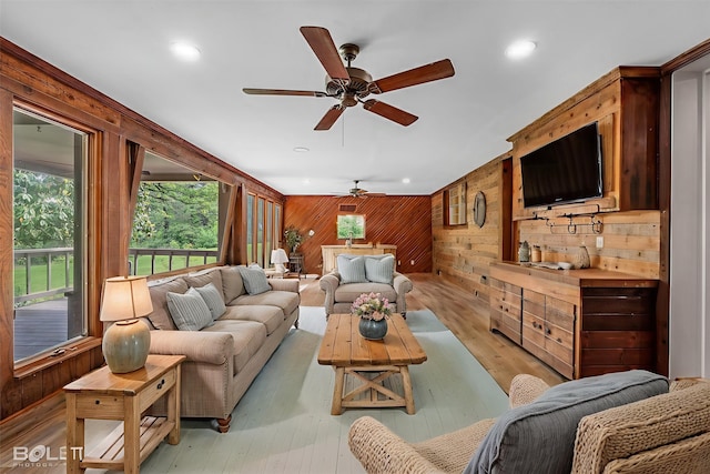 5764 Jefferson Paige Rd, Shreveport, LA 71119 - living area featuring wood walls, ceiling fan, light wood-style flooring, and recessed lighting