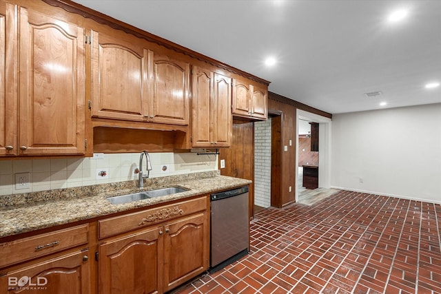 5764 Jefferson Paige Rd, Shreveport, LA 71119 - kitchen with dishwasher, tasteful backsplash, brick patterned floors, recessed lighting, and light stone countertops